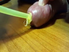 A man excavates worms from his dick hole in a repulsive dilettante insertion movie clip.